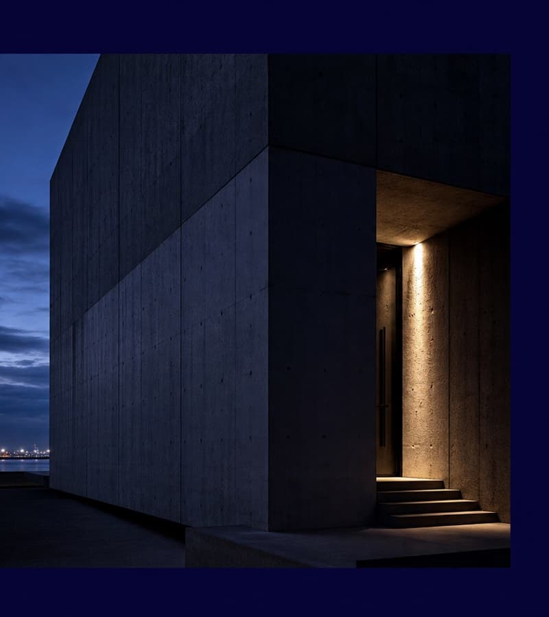 Concrete corner at dusk: institutional infrastructure after hours.